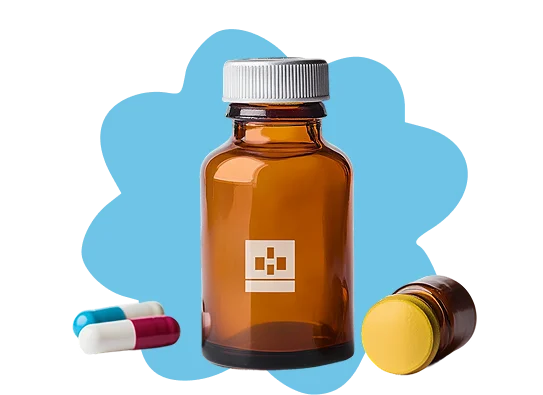 A medicine bottle and pills